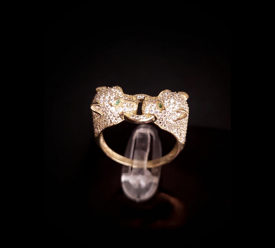 Zlatý dizajnový prsteň pumy