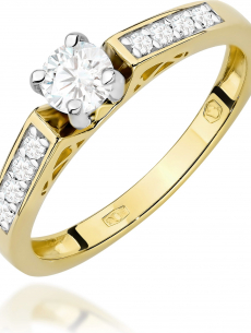 Zlatý L. briliantový prsteň...