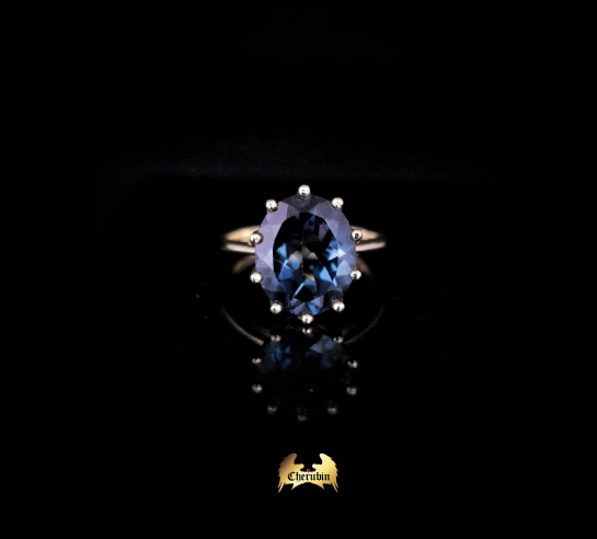Zlatý topásový prsteň London Blue